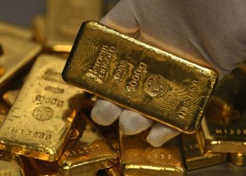 Gold jumps to record above $2,460 an ounce on hopes Fed will soon cut rates