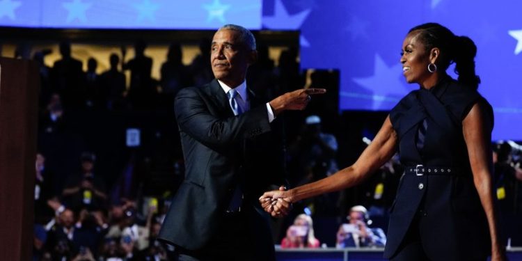 Obamas electrify Democrats at Chicago convention