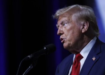 24 hours of Trump: QAnon tributes, crude attacks and hawking pieces of his suit