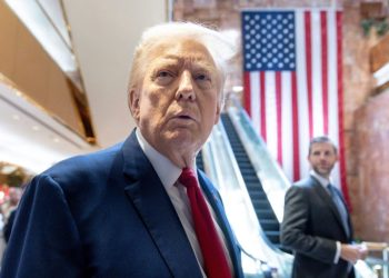 Now, Trump says, the photo of him with E. Jean Carroll may be ‘AI’