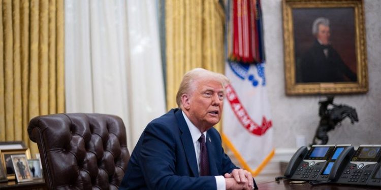 After raucous first week in office, Donald Trump to keep his foot on the gas